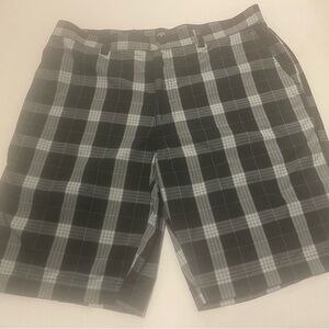 Callaway Men’s Opti-Performance Golf Shorts in black, gray, and blue plaid.
